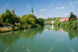 cityscape of a small village near a river